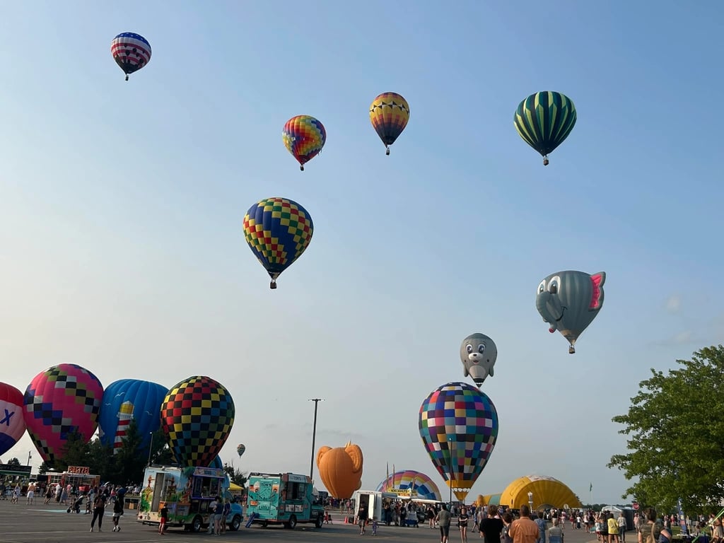 Colorful hot air balloons floating in the sky