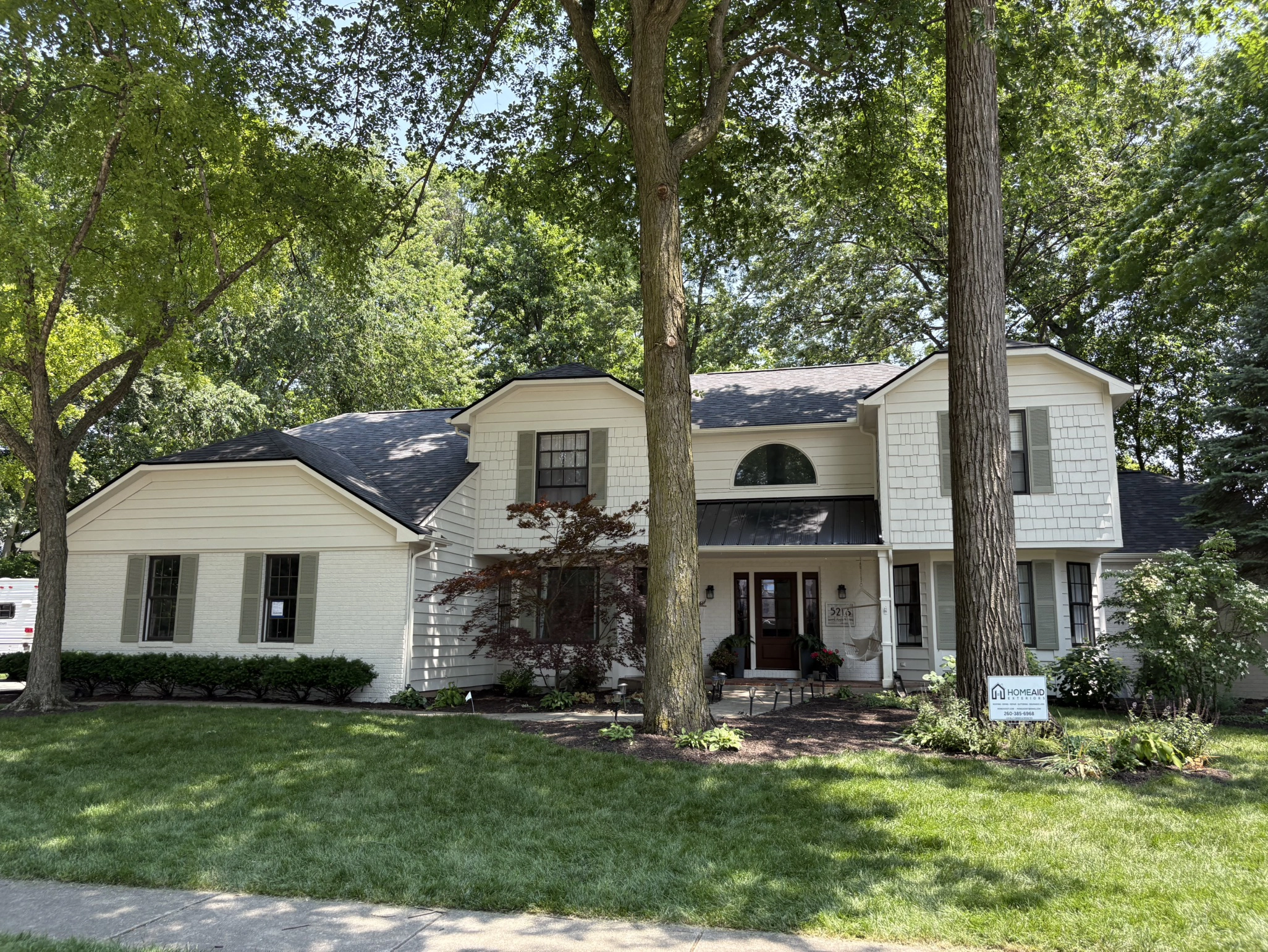 Two-story home with new roof replacement