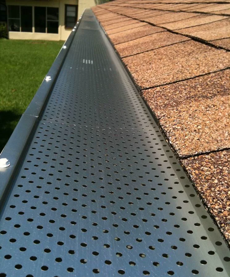 Stainless steel leaf guard installed on seamless gutter